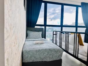 MMM New 2BR or 3BR Homey Getaway stay 7 to 10 pax at Urban Suites, Georgetown by URBAN STAYCATION LOD COSY