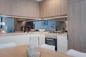 1BR The Coterie Apartments - 1 Bedroom Deluxe Apartmen