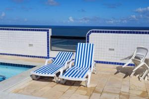 Apartamento a 130 metros da Praia, e Piscina na Cobertura do Prédio