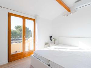 Villas Pavillon T3 avec piscine, climatisation et parking a Narbonne-Plage - FR-1-409-248 : photos des chambres