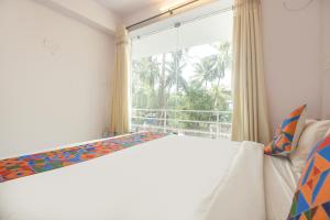 FabHotel Holiday Suites