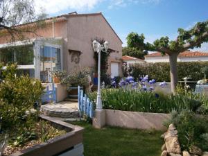 Appartements maison climatisee dans jardin : photos des chambres