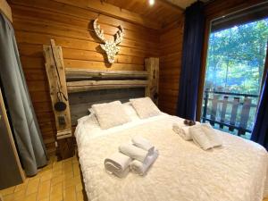 Chalets LE RENNE Chalet en bois au calme avec SPA Jacuzzi : photos des chambres