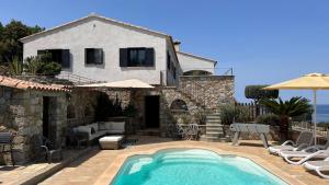 Maisons de vacances Villa Ghjunchitu - Vue mer et Piscine privee proche de l-ile rousse : photos des chambres