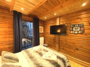 Chalets LE LOUP Chalet en bois : photos des chambres