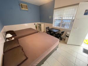 Remar Suítes 03 - Melhor localização do Guarujá, perto da praia e com ar condicionado!