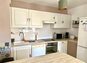 Appartements Villa Louise - Appartement Spacieux proche digue avec jardin : photos des chambres