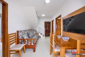 Apartamento com ar condicionado e churrasqueira a 100 metros da praia - 02 dormitórios - Edifício Água Viva - apto 28