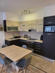 TriAngol Apartman: fürdő, belváros, egyetem