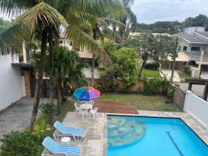 Casa na Praia Riviera de São Lourenço 4 Suítes para até 12 pessoas 4min a pé da Praia e 11 min a pé do Shopping