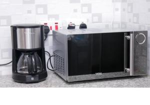 3 BEDROOM LIWANDO HOME at Greatwall Gardens next to Greatwall Mall, 15 Minutes from JKIA Airport With FREE WIFI & Parking, Enjoy Entire Unit in a Gated Community manned with Security 24 Hours