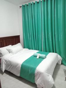 3 BEDROOM LIWANDO HOME at Greatwall Gardens next to Greatwall Mall, 15 Minutes from JKIA Airport With FREE WIFI & Parking, Enjoy Entire Unit in a Gated Community manned with Security 24 Hours