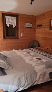 Appartements Chalet Coquelicot - confort montagnard et ambiance chaleureuse au coeur de Saint Martin de Belleville : photos des chambres