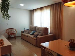 Apartamento aconchegante em condomínio perto da praia