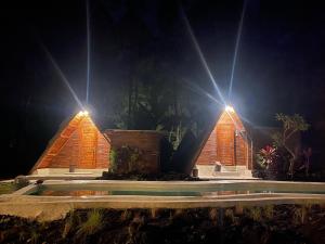 Triangular house and hot spring