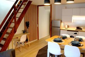 Appartements The Cozy Downtown Duplex : photos des chambres
