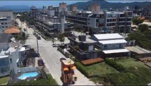 MAJESTOSO DUPLEX COM JACUZZI DE FRENTE PARA O MAR, 3 SUÍTES, Apt 404