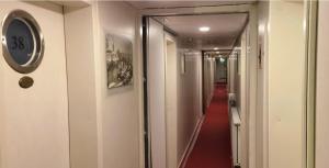 Quadruple Cabin 2nd Class -Shipotel Eastern room in Shipotel-Berlin GmbH Shipotel Eastern & Shipotel Western