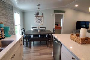 Waterfront home with private dock, walk to beach