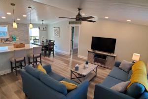 Waterfront home with private dock, walk to beach