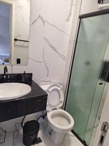 Apto em Bertioga , pé na areia