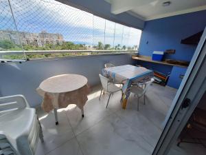 Apto em Bertioga , pé na areia