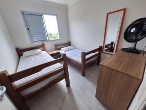 Apto em Bertioga , pé na areia