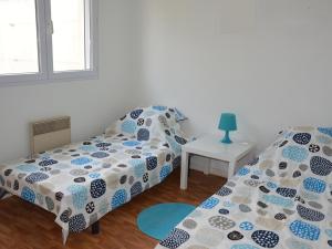 Maison bord de mer pour 9 pers. avec terrasse, BBQ, WiFi - à 300m de la plage, tout confort - FR-1-323-501