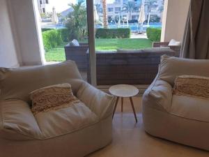 Mangroovy - 2BR Prodigious Ground Pool & Sea view