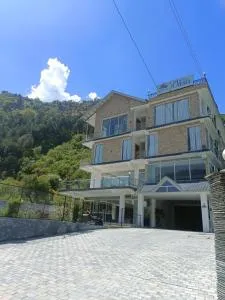 Gezellig Inn - Hotel Oasis - Shamshi