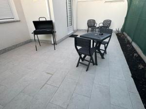 Appartements Charmante maison avec terrasse : photos des chambres