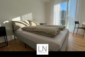 Modernes Neubau Apartment mit Garten & Terrasse ideal für Urlaub oder Business