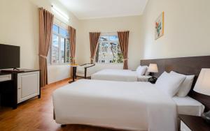 Phòng 3 người - 3 giường đơn (Triple Room - 3 Single Beds)