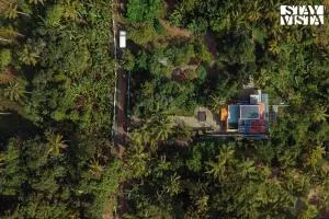 StayVista at Nature Nook with Pvt Pool & Terrace Access - Ollur