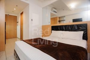 RedLiving Apartemen TreePark City - Hunian Idamanku Tower Alpine