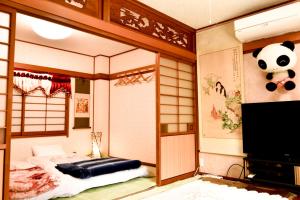 媛楽園 松山中心地及び道後温泉に近い家族やグループ旅行の多人数が泊まれる快適な宿