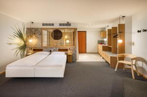 Junior Suite with Kitchenette room in Alpha-Palmiers by Fassbind