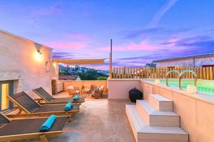 Villa Mirage Kournas Rooftop Sunset by Posarelli