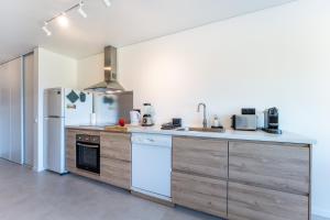 Tasteful 1 BDR Flat WBalcony & Pool by LovelyStay