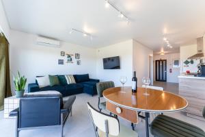 Tasteful 1 BDR Flat WBalcony & Pool by LovelyStay