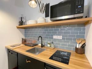 Appartements La boheme place aux herbes : photos des chambres