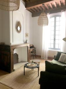Appartements La boheme place aux herbes : photos des chambres