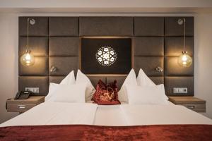 Hotel Norica - Thermenhotels Gastein mit dem Bademantel direkt in die Therme