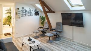 Appartements Riverside - Charme et Confort : photos des chambres