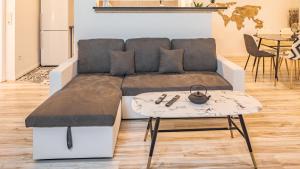 Appartements Riverside - Charme et Confort : photos des chambres
