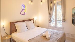 Appartements Riverside - Charme et Confort : photos des chambres