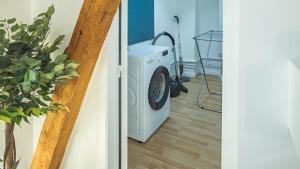 Appartements Riverside - Charme et Confort : photos des chambres