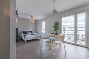 Appartements Camille - Studio wifi et gare : photos des chambres