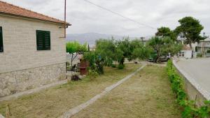 Apartments by the sea Postira, Brac - 22163