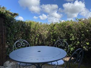 Appartements 400 - Magnifique T3, les pieds dans l'eau : Appartement - Vue sur Jardin